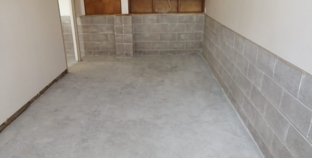 Concrete floor preparation for tile installation