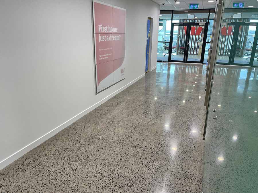 Slip-resistant polished concrete floor in a commercial space